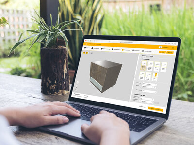 992620550 Mockup image of a woman using and typing on laptop with blank white desktop screen with nature background