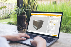 Mockup image of a woman using and typing on laptop with blank white desktop screen with nature background